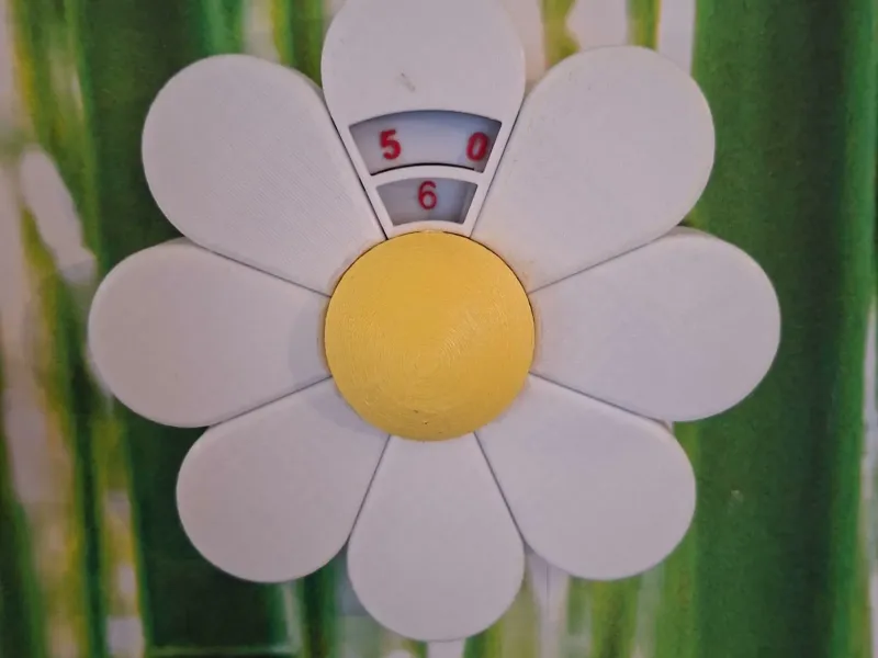 Horloge fleur sans aiguille et tournant à l'envers