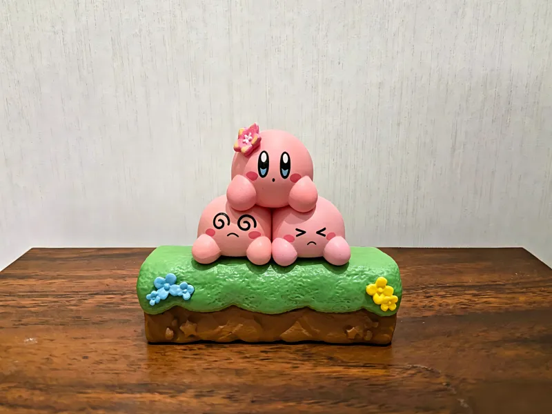 Three Little Kirby Figurines